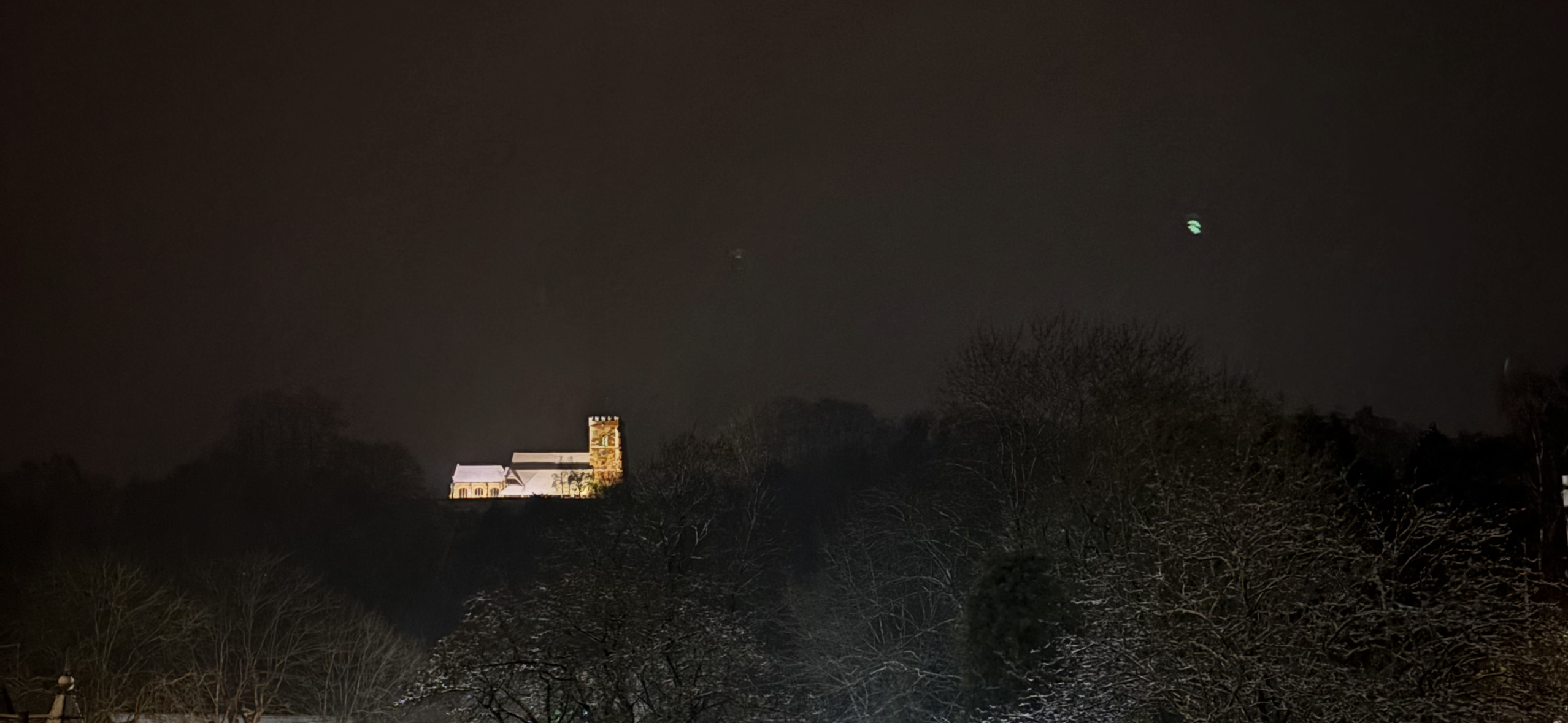 Snowy church on the hill